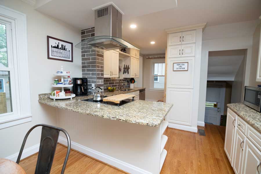 After---Interior---Existing-Kitchen-with-New-Hood-and-Backsplash