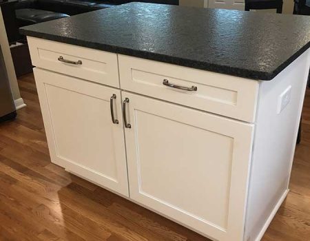 After - Island with Leathered Granite Countertops