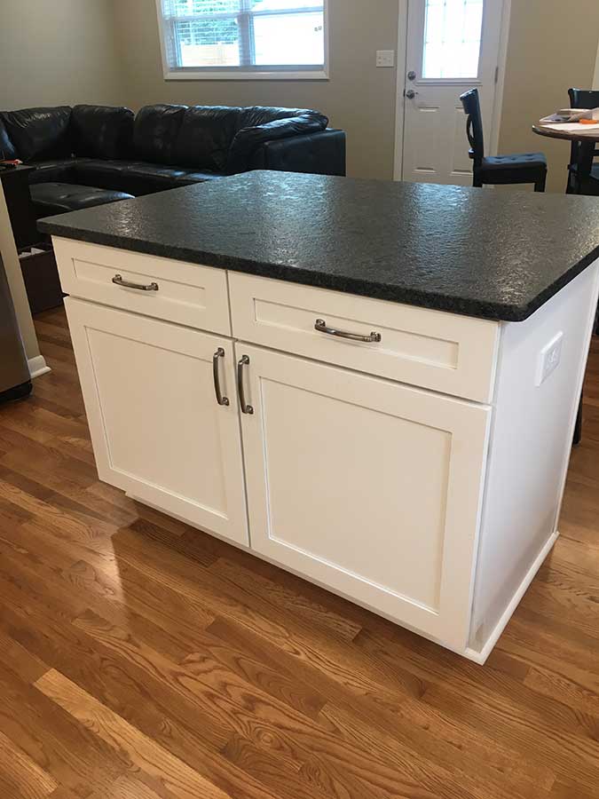 After - Island with Leathered Granite Countertops