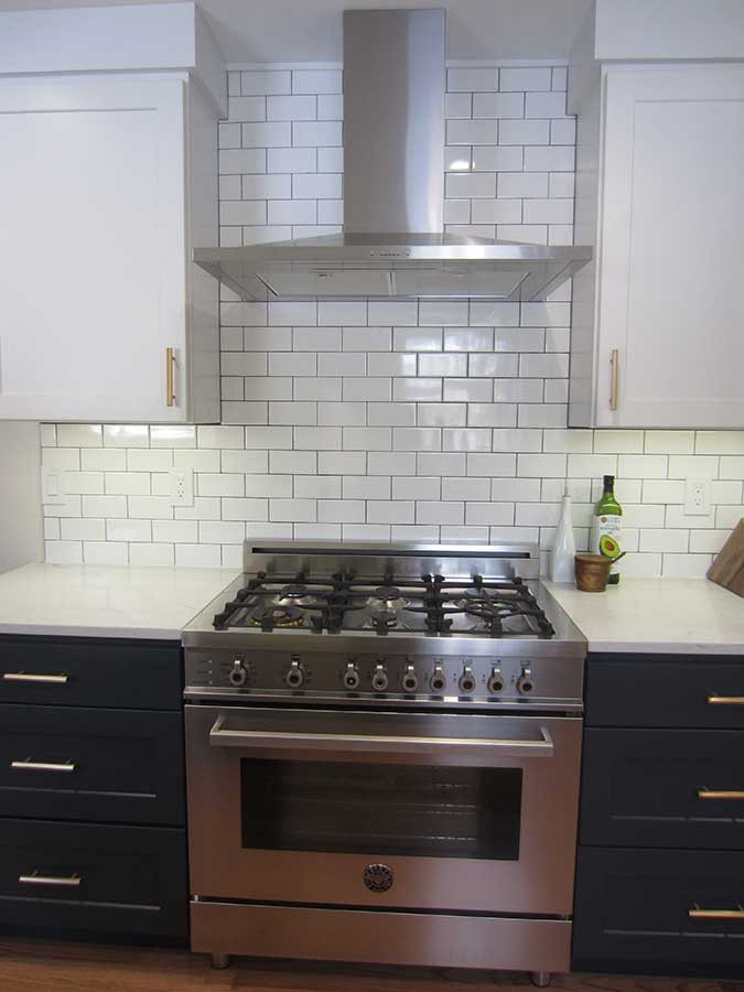 After - Updated Chimney Hood and White Subway Tile