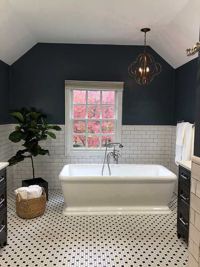 After - Updated Free-Standing Soaking Tub And Tile Wainscotting